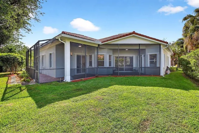 a view of a back yard of the house