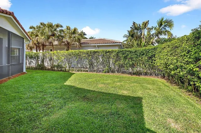 a view of a backyard with a garden