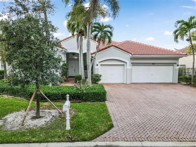 a house view with a garden space