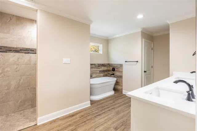 a bathroom with a double vanity sink and mirror