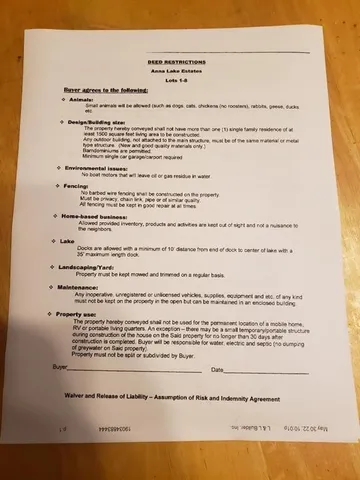 a view of swimming pool with a yard