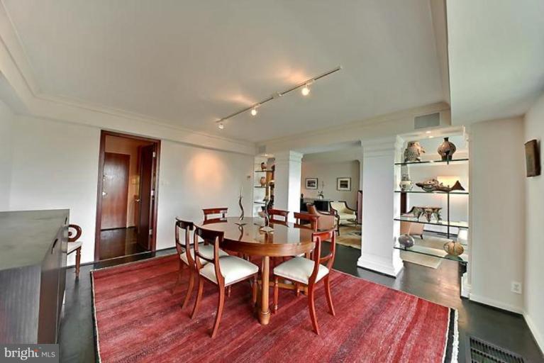 550 N Street Southwest, Unit S802 Washington, DC 20024 - Photo 7 of 30 a view of a dining room with furniture and wooden floor