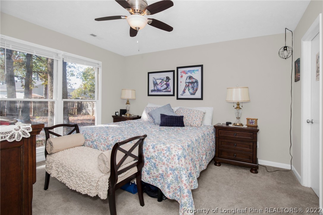 930 Rim Road Fayetteville, NC 28314 - Photo 18 of 30 a bed room with a bed and a window