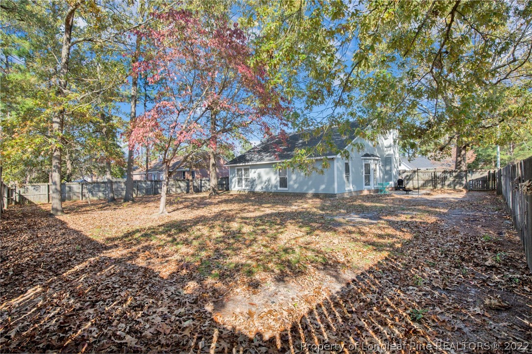 930 Rim Road Fayetteville, NC 28314 - Photo 28 of 30 a view of road with large trees