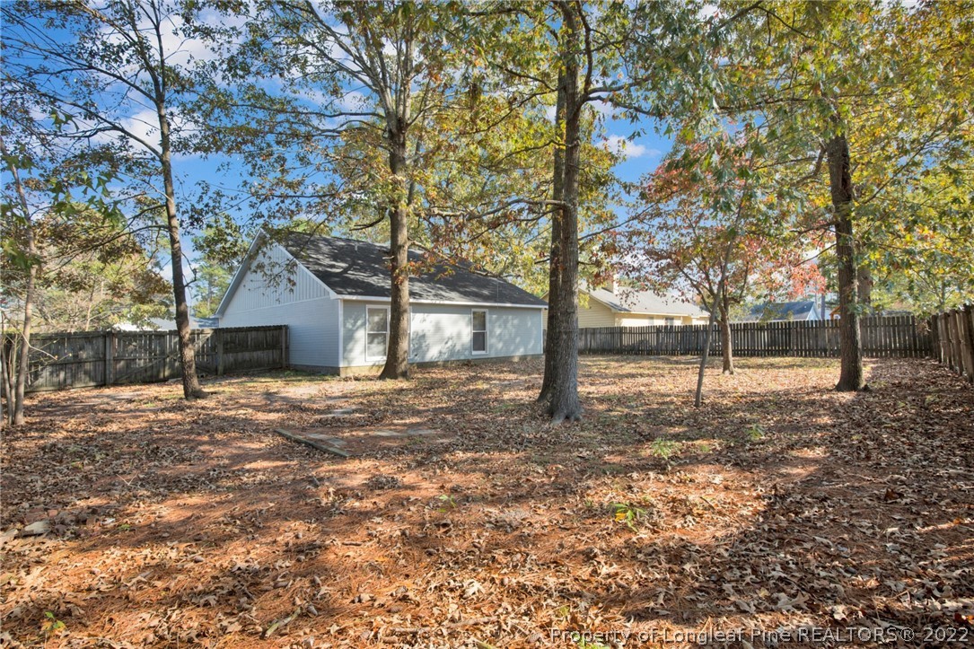 930 Rim Road Fayetteville, NC 28314 - Photo 29 of 30 a view of a house with a yard