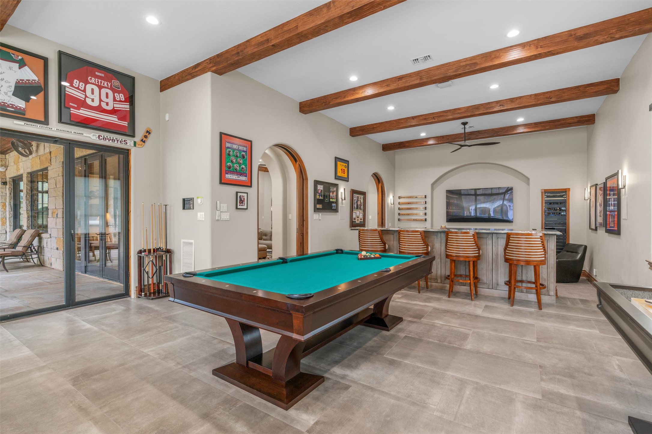 4407 Island Cove Austin, TX 78731 - Photo 19 of 40 The game room has direct access to the covered patio and pool area