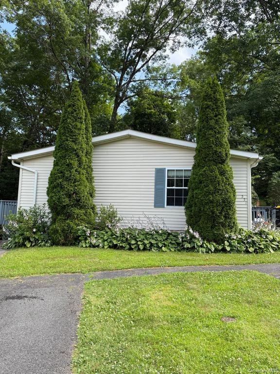 551 5th Avenue Middletown, NY 10941 - Photo 2 of 25 View of side of property featuring a yard