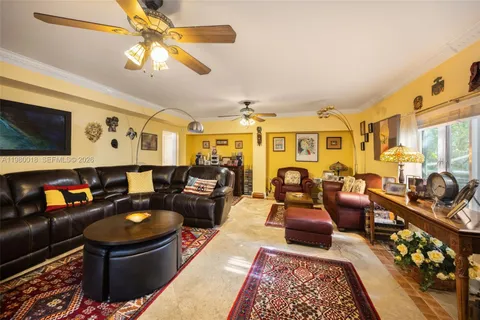 a living room with furniture fireplace and a flat screen tv