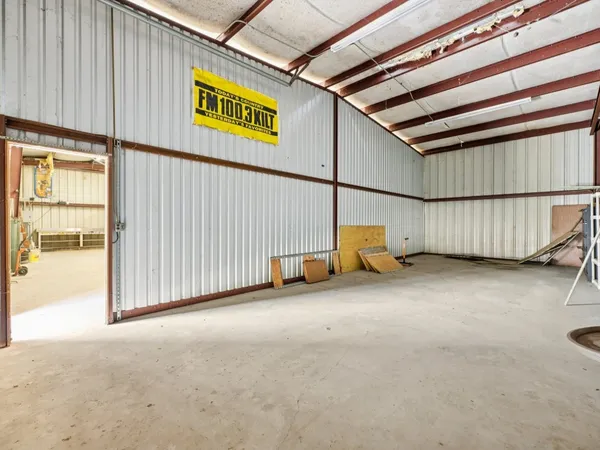 a view of a back yard of the building
