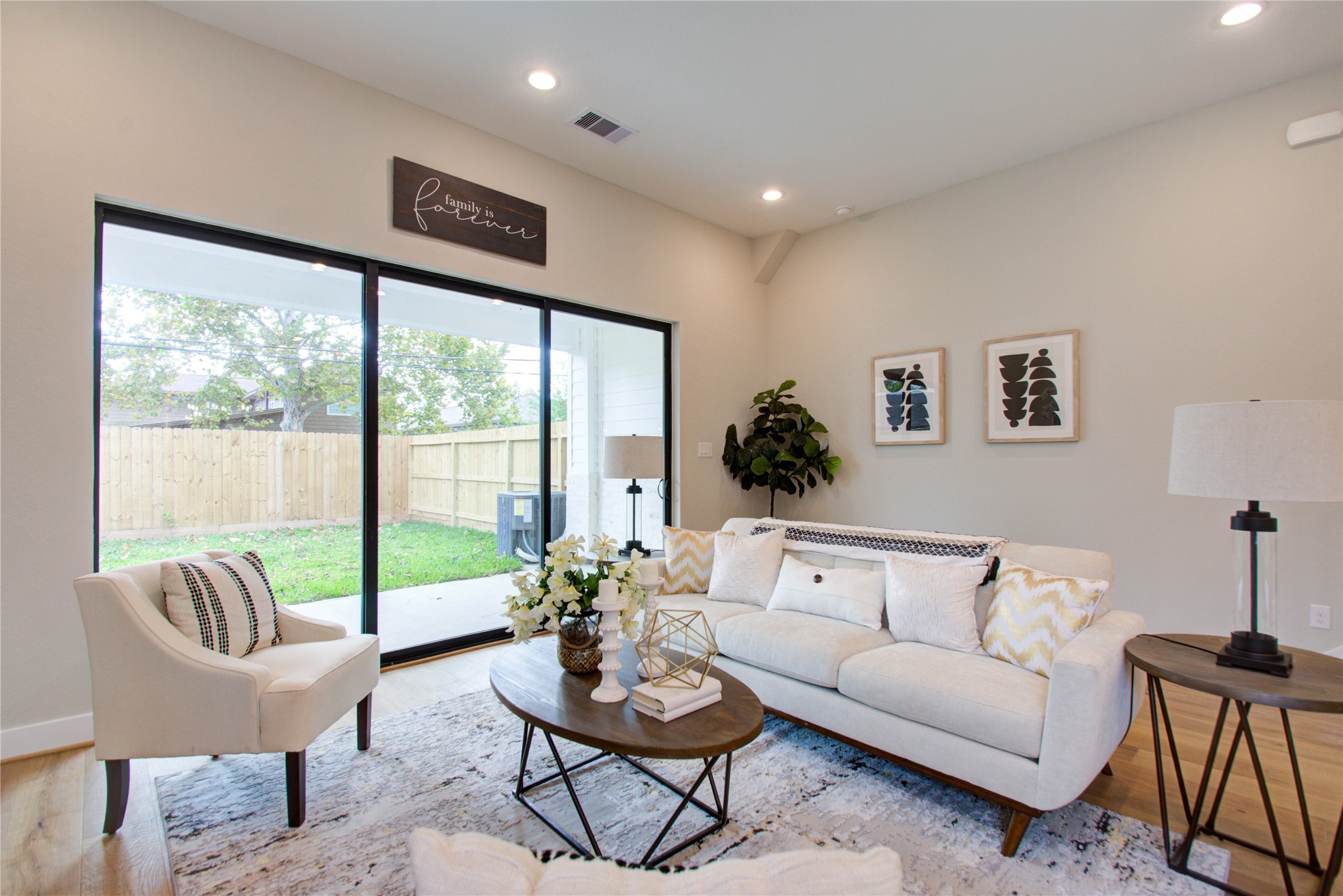 110 East 28th Street Houston, TX 77008 - Photo 22 of 43 a living room with furniture and a large window
