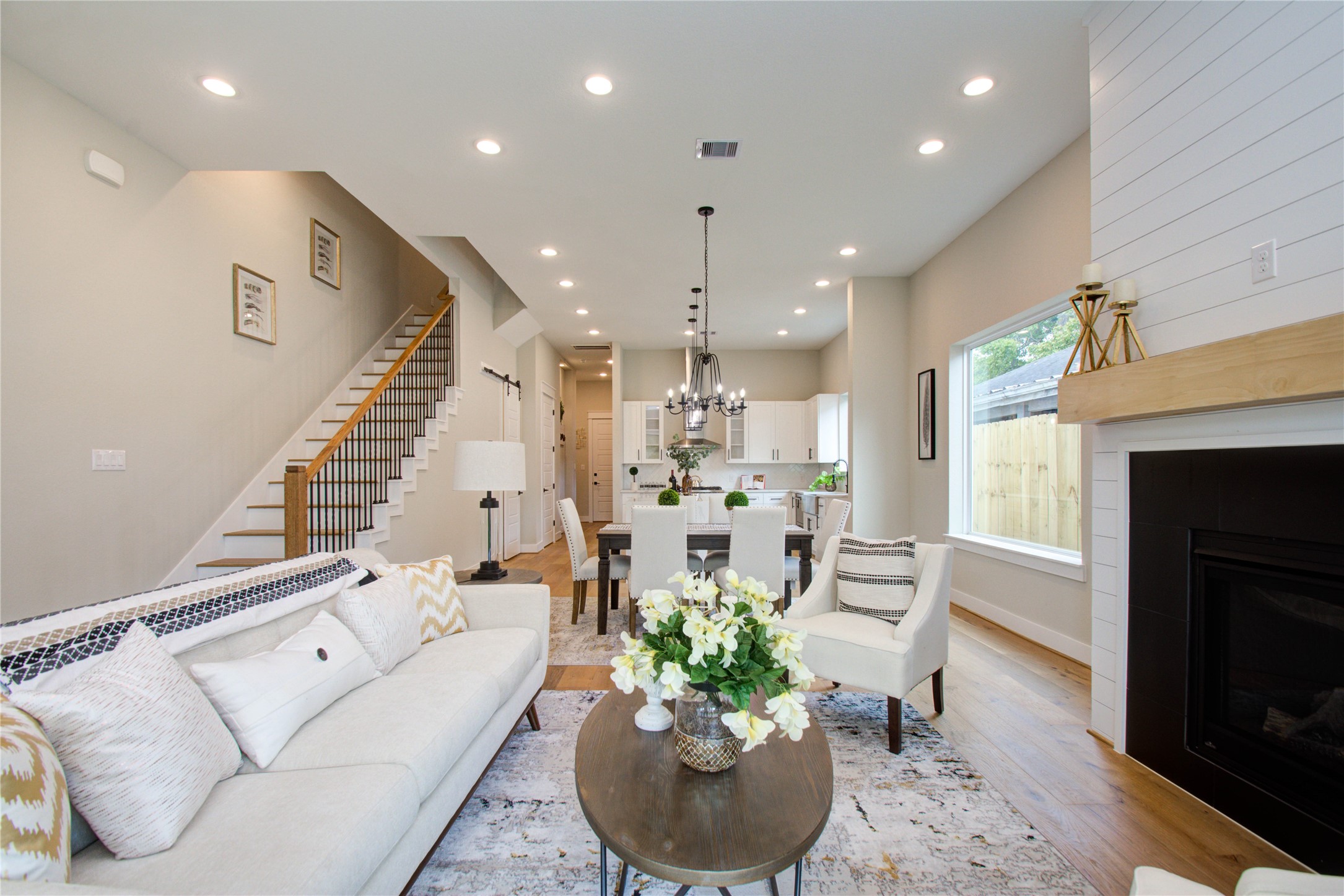 110 East 28th Street Houston, TX 77008 - Photo 23 of 43 a living room with furniture potted plant and a fireplace