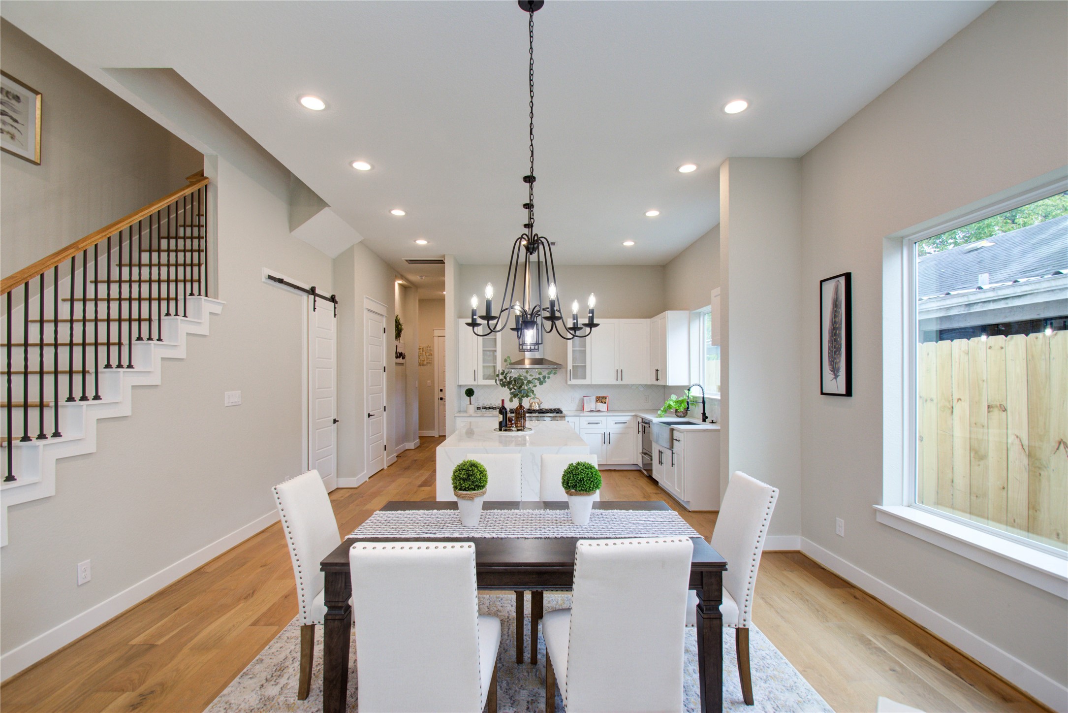 110 East 28th Street Houston, TX 77008 - Photo 32 of 43 a view of a dining room with furniture window and wooden floor