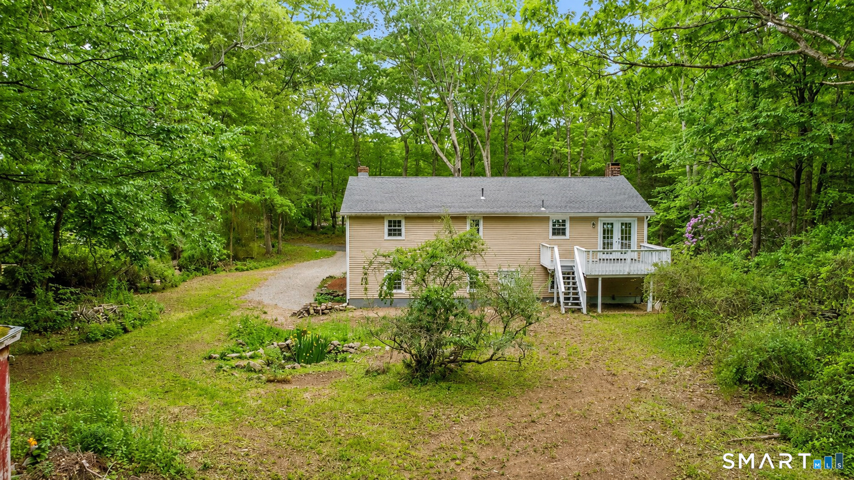 20 Quiet Woods Road East Hampton, CT 06424 - Photo 36 of 40 an aerial view of a house with a yard table and chairs