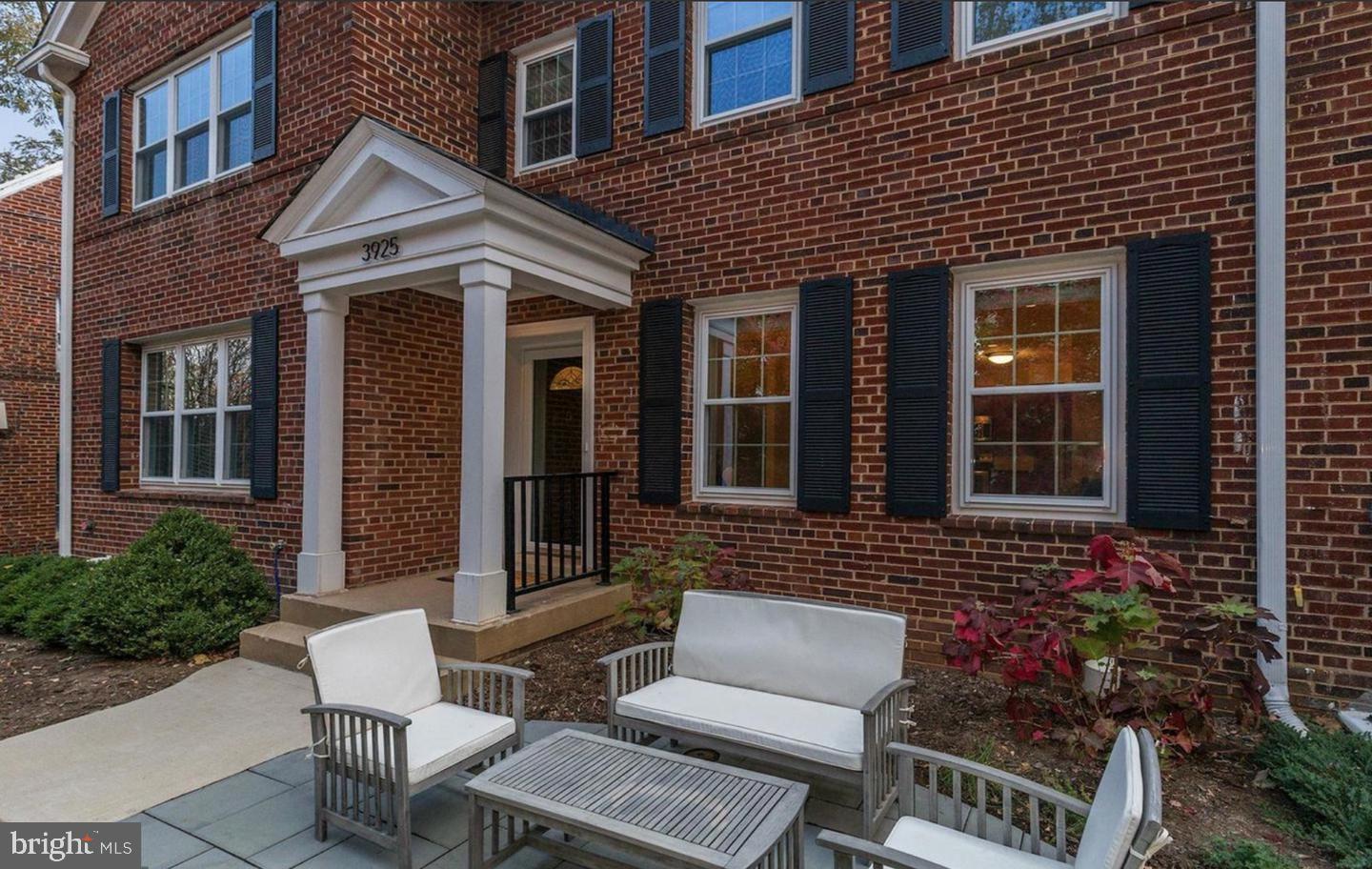 3925 Fulton Street Northwest, Unit 5 Washington, DC 20007 - Photo 3 of 19 a view of brick house with a bench in patio