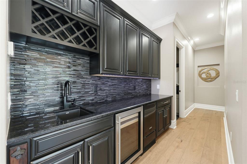 855 Southeast 87th Street Ocala, FL 34480 - Photo 25 of 79 a kitchen with stainless steel appliances a sink and cabinets