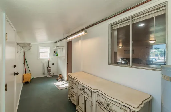 workspace with wooden floor and windows