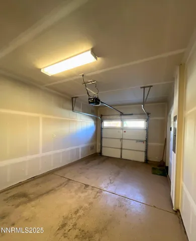 a front view of a building with a yard