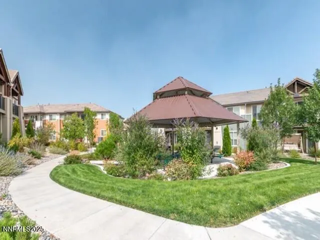 front view of a house with a garden