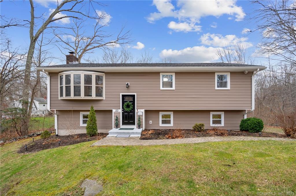 23 Nod Hill Road Clinton, CT 06413 - Photo 1 of 1 a front view of a house with a yard
