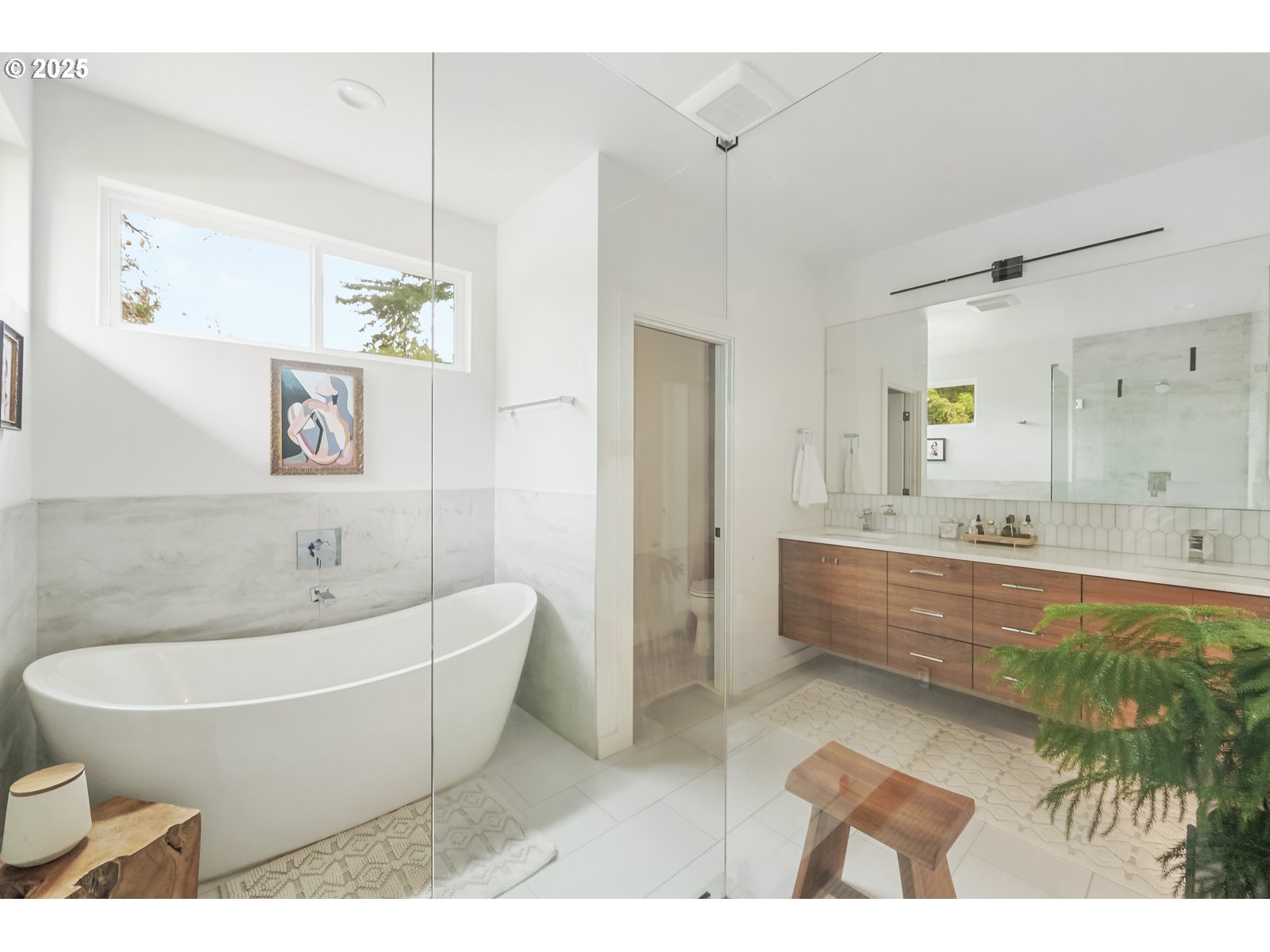 11504 Northwest Damascus Street Portland, OR 97229 - Photo 19 of 48 a bathroom with a bathtub and a sink