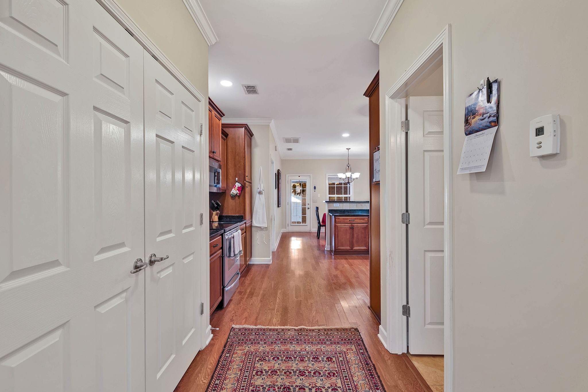 2138 Cason Lane Murfreesboro, TN 37128 - Photo 19 of 55 a view of a hallway with wooden floor and living room