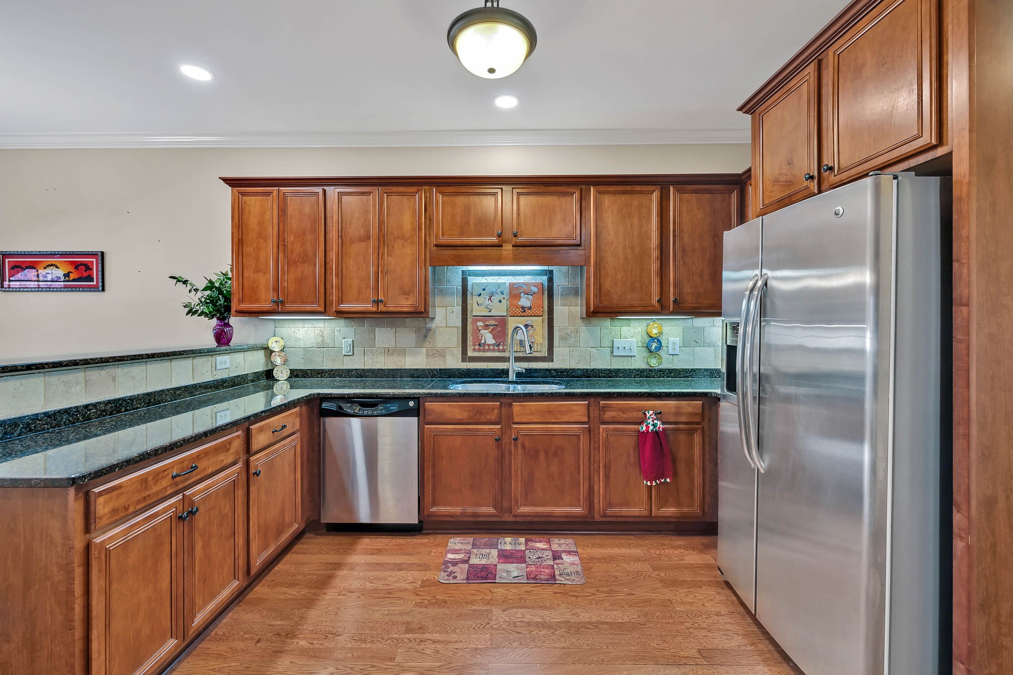 2138 Cason Lane Murfreesboro, TN 37128 - Photo 21 of 55 a kitchen with stainless steel appliances granite countertop a refrigerator and a sink