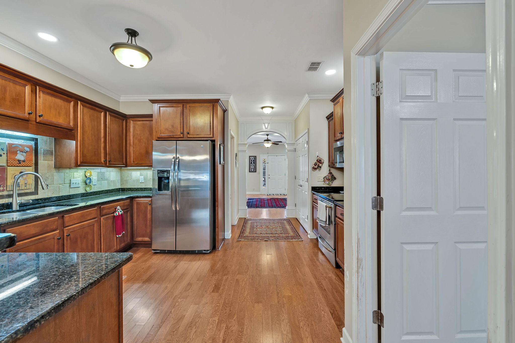 2138 Cason Lane Murfreesboro, TN 37128 - Photo 22 of 55 a kitchen with stainless steel appliances granite countertop a refrigerator and a sink