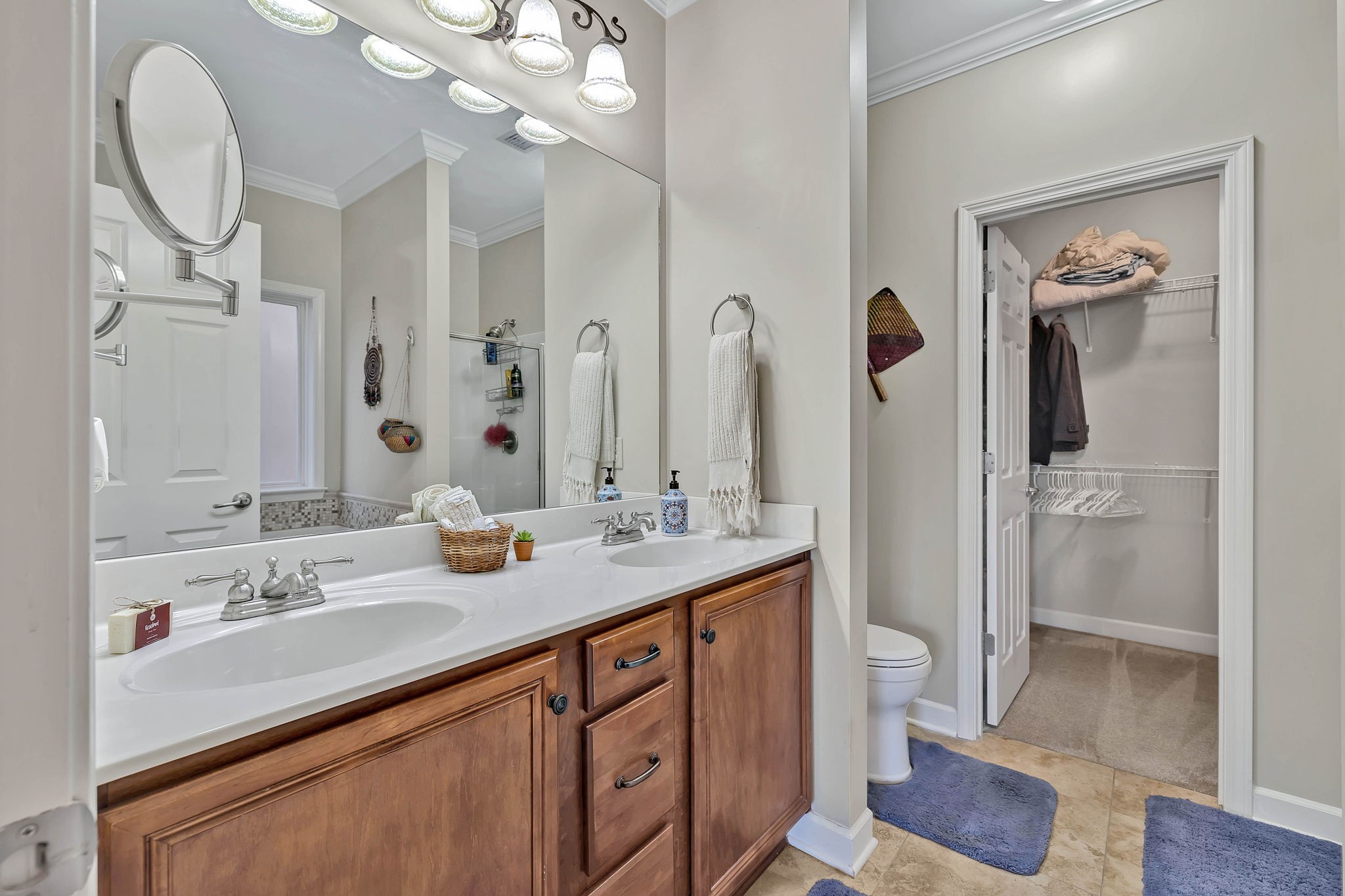 2138 Cason Lane Murfreesboro, TN 37128 - Photo 26 of 55 a bathroom with a sink a toilet and a mirror