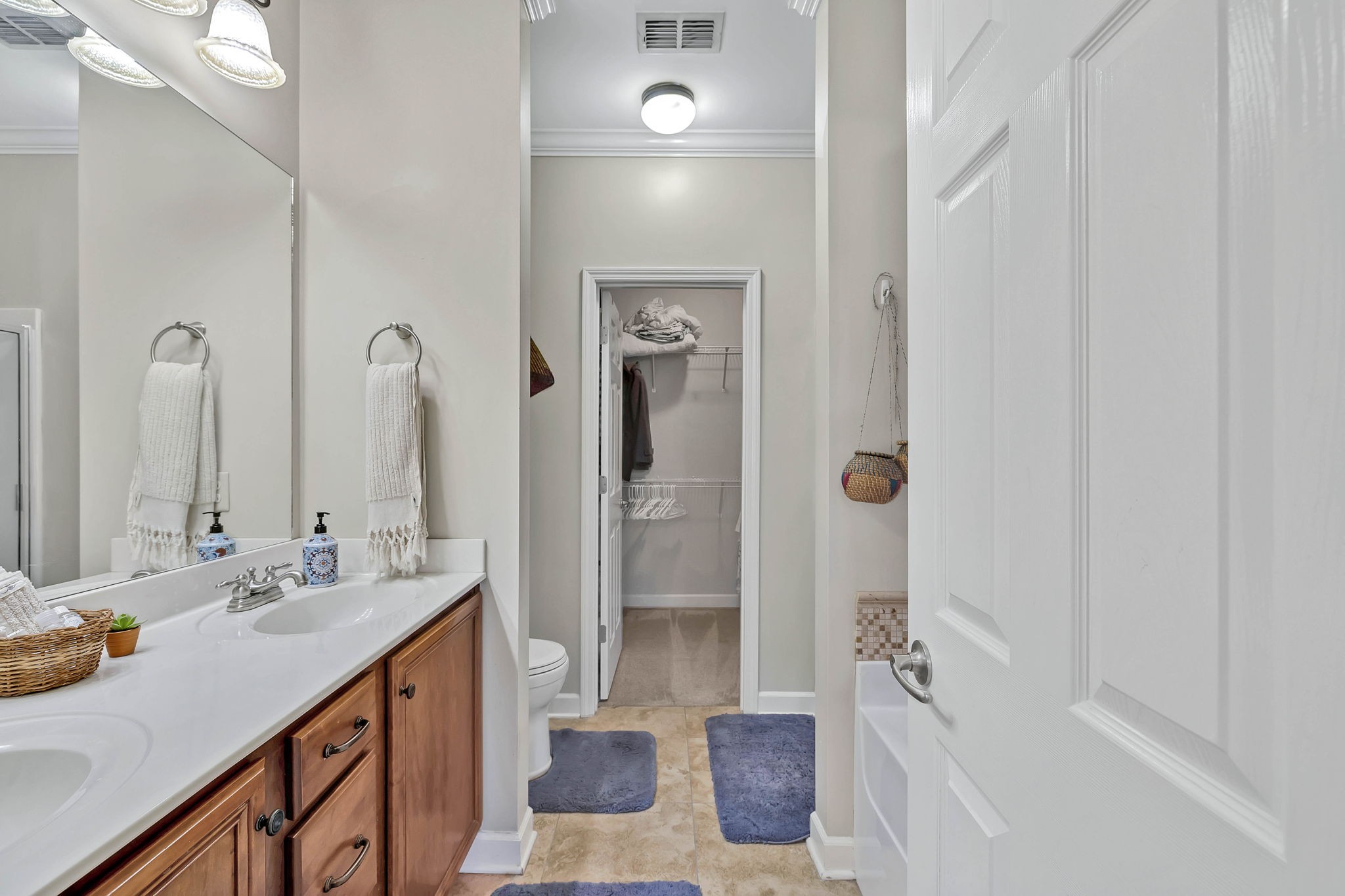 2138 Cason Lane Murfreesboro, TN 37128 - Photo 28 of 55 a bathroom with a tub sink and mirror