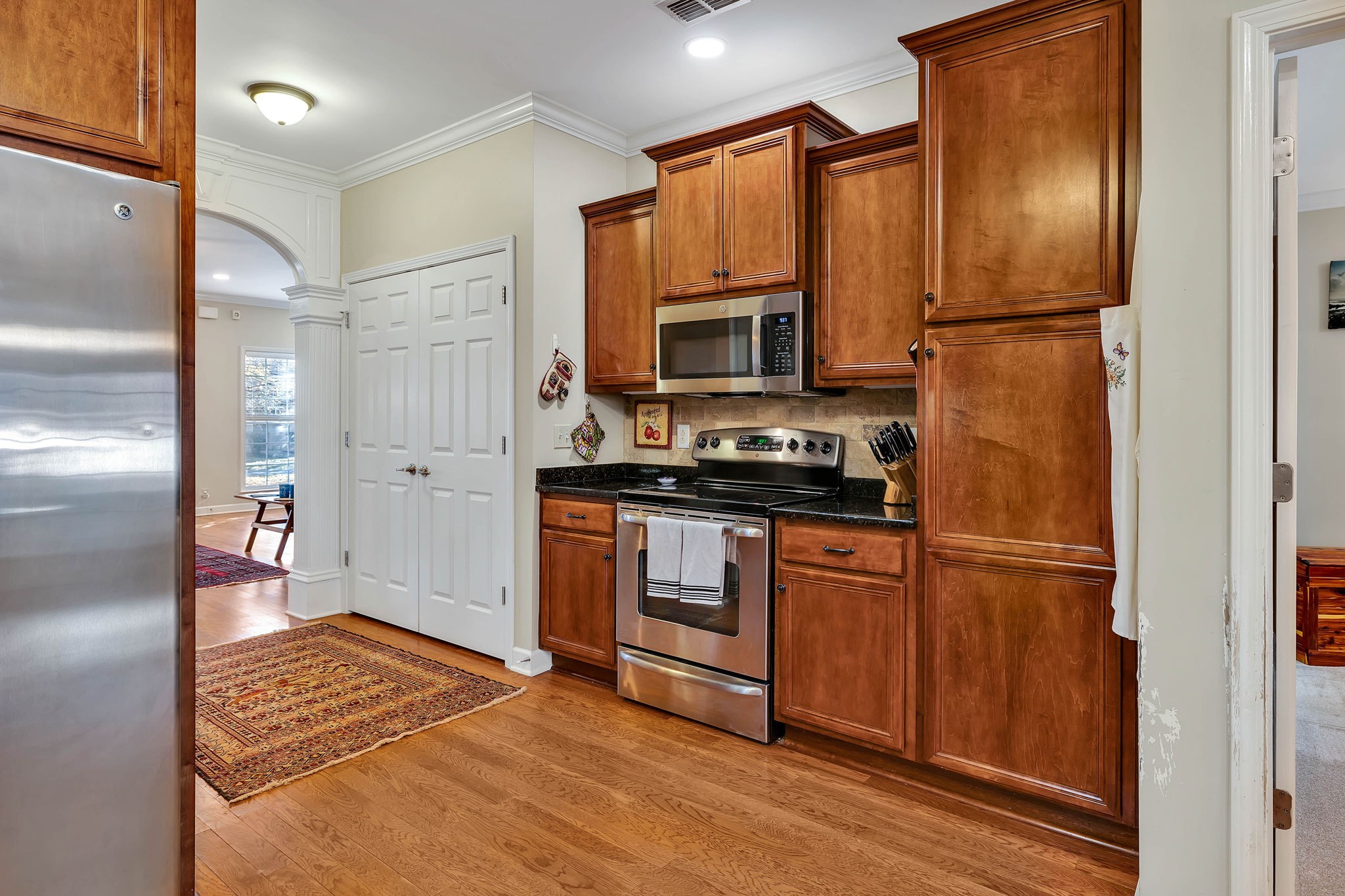 2138 Cason Lane Murfreesboro, TN 37128 - Photo 31 of 55 a kitchen with stainless steel appliances granite countertop a refrigerator stove and sink