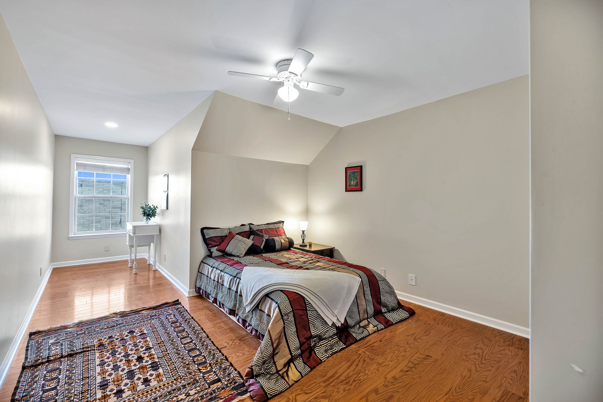 2138 Cason Lane Murfreesboro, TN 37128 - Photo 41 of 55 a bedroom with a large bed and a chandelier