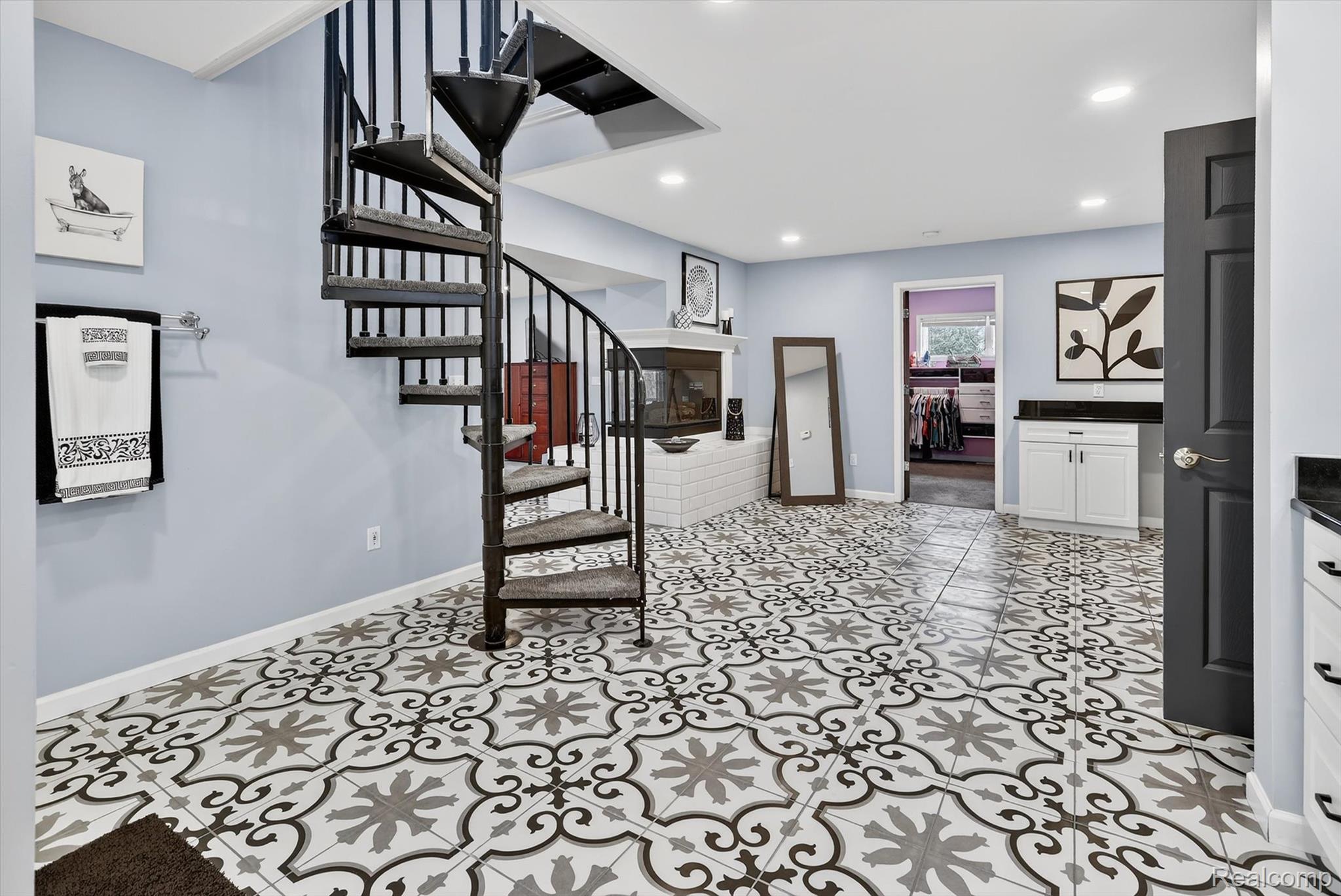 552 North McKinley Road Flushing, MI 48433 - Photo 35 of 98 Stairway with recessed lighting and tile patterned flooring
