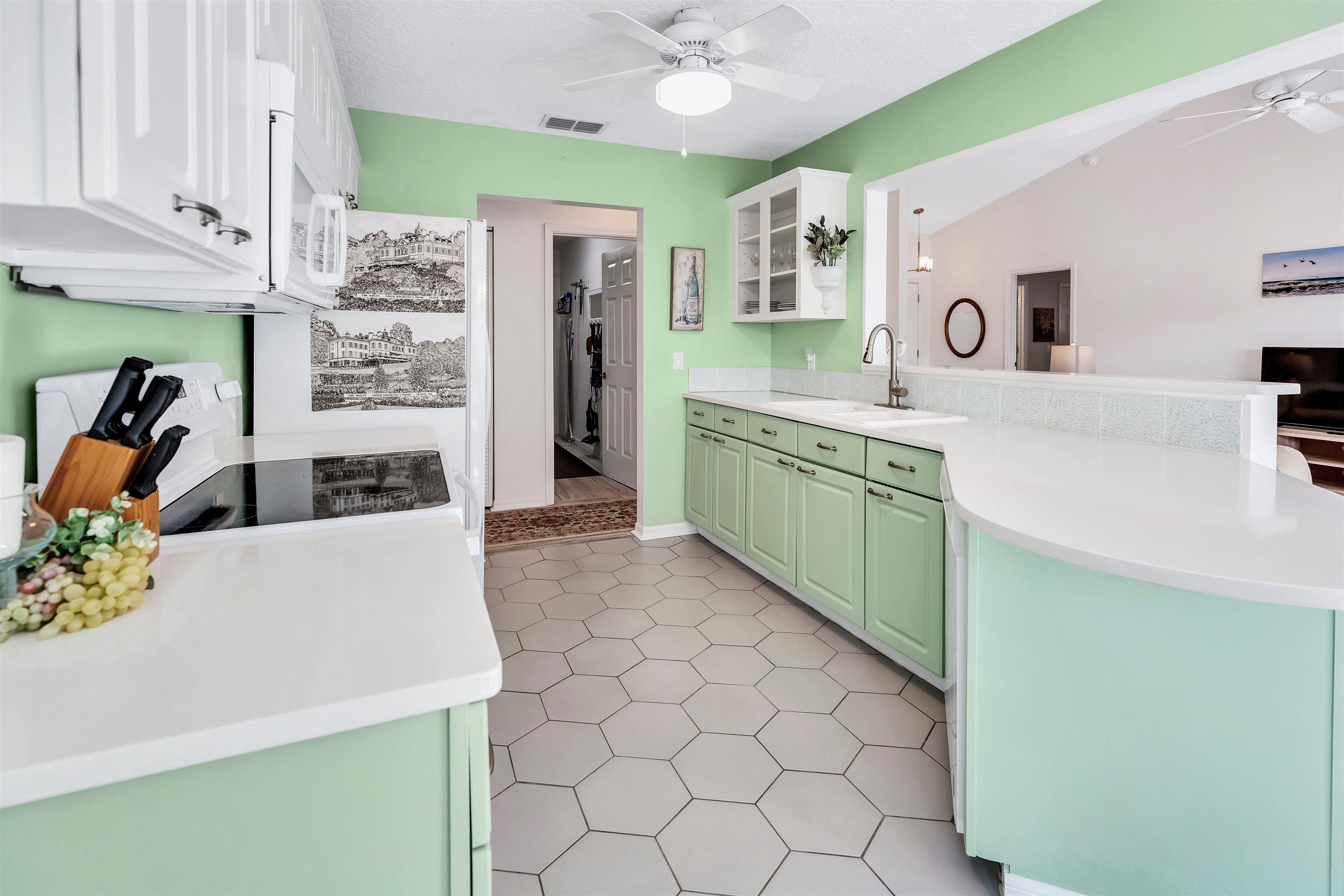 134 Pelican Road St. Augustine, FL 32086 - Photo 20 of 43 a spacious bathroom with a sink a mirror and shower