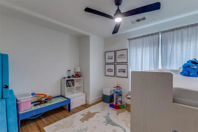 a room with furniture and gym equipment