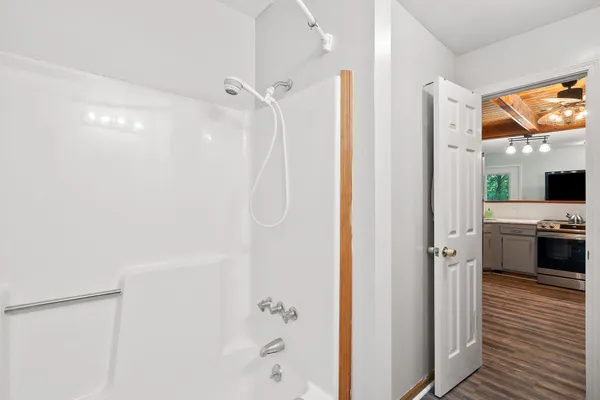 a bathroom with a sink a vanity and a mirror