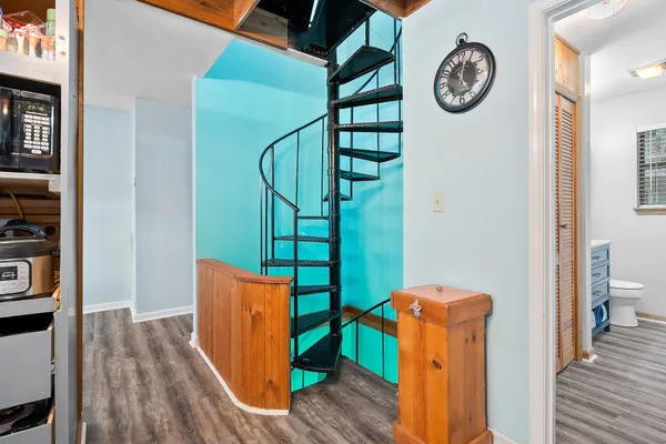 a view of a hallway with entryway