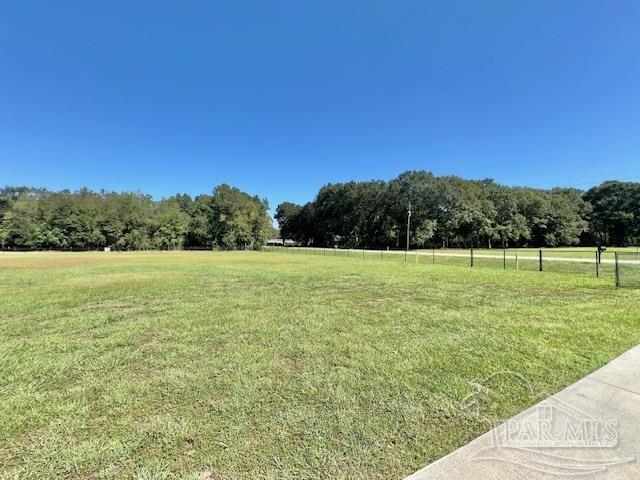 9352 Hall Road Grand Bay, AL 36541 - Photo 31 of 39 a view of a field with a yard