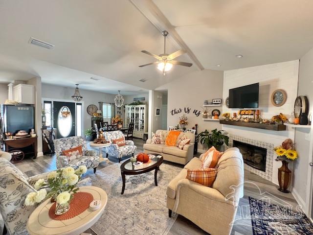 9352 Hall Road Grand Bay, AL 36541 - Photo 5 of 39 a living room with furniture a flat screen tv and kitchen view