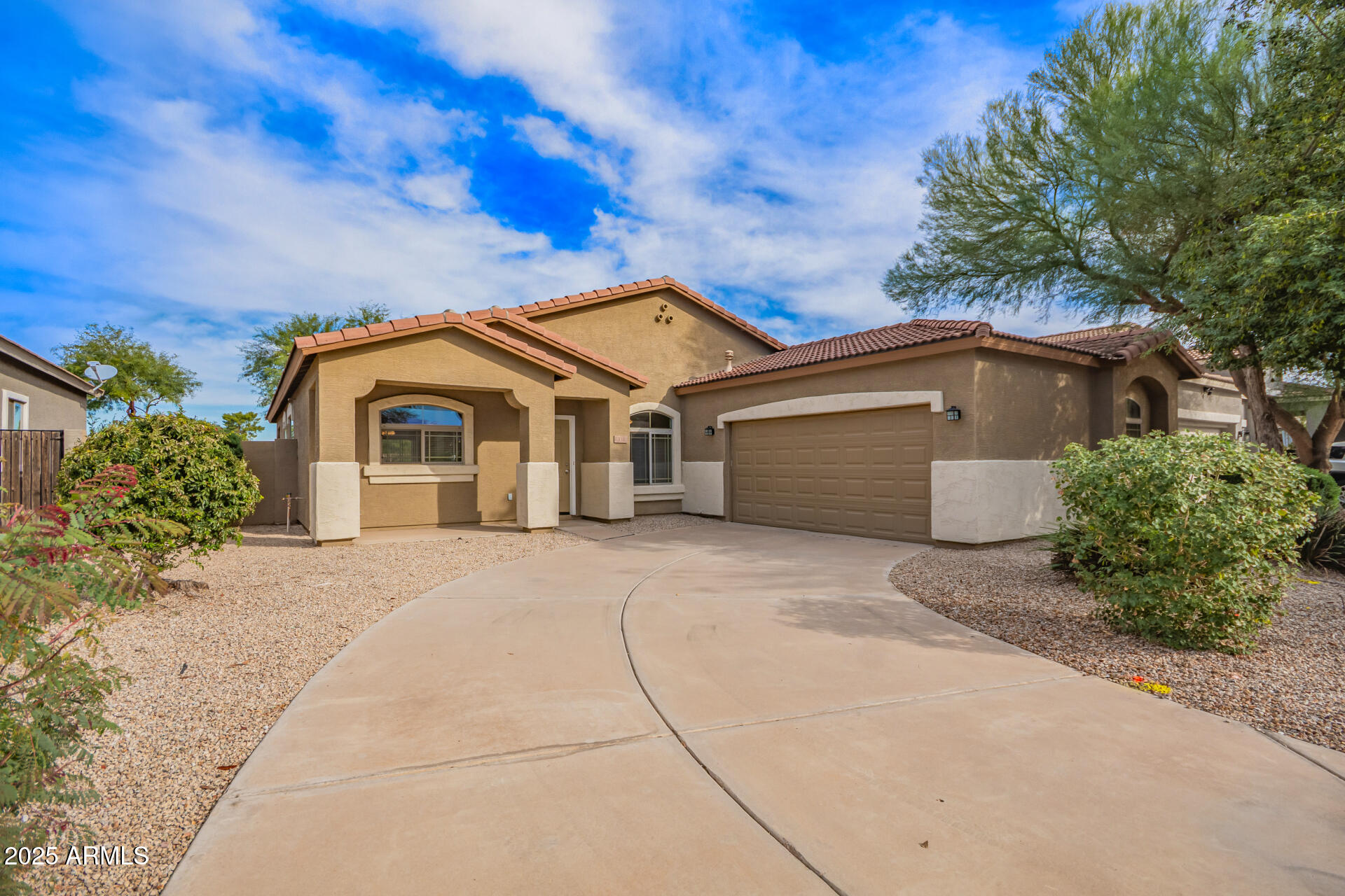 21382 East Via Del Rancho Queen Creek, AZ 85142 - Photo 1 of 29 a front view of a house with a yard and garage