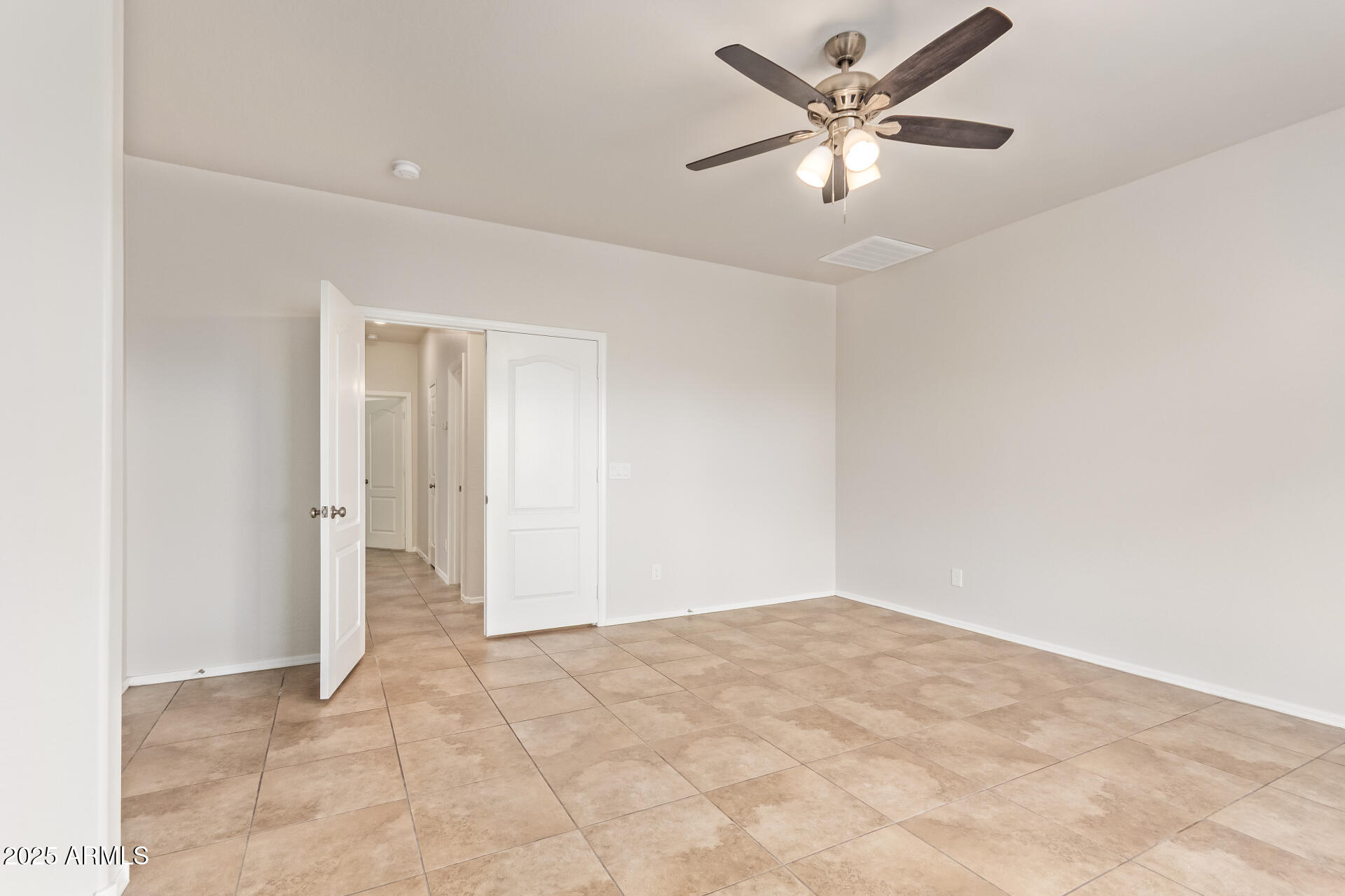 21382 East Via Del Rancho Queen Creek, AZ 85142 - Photo 14 of 29 an empty room with fan and a ceiling fan
