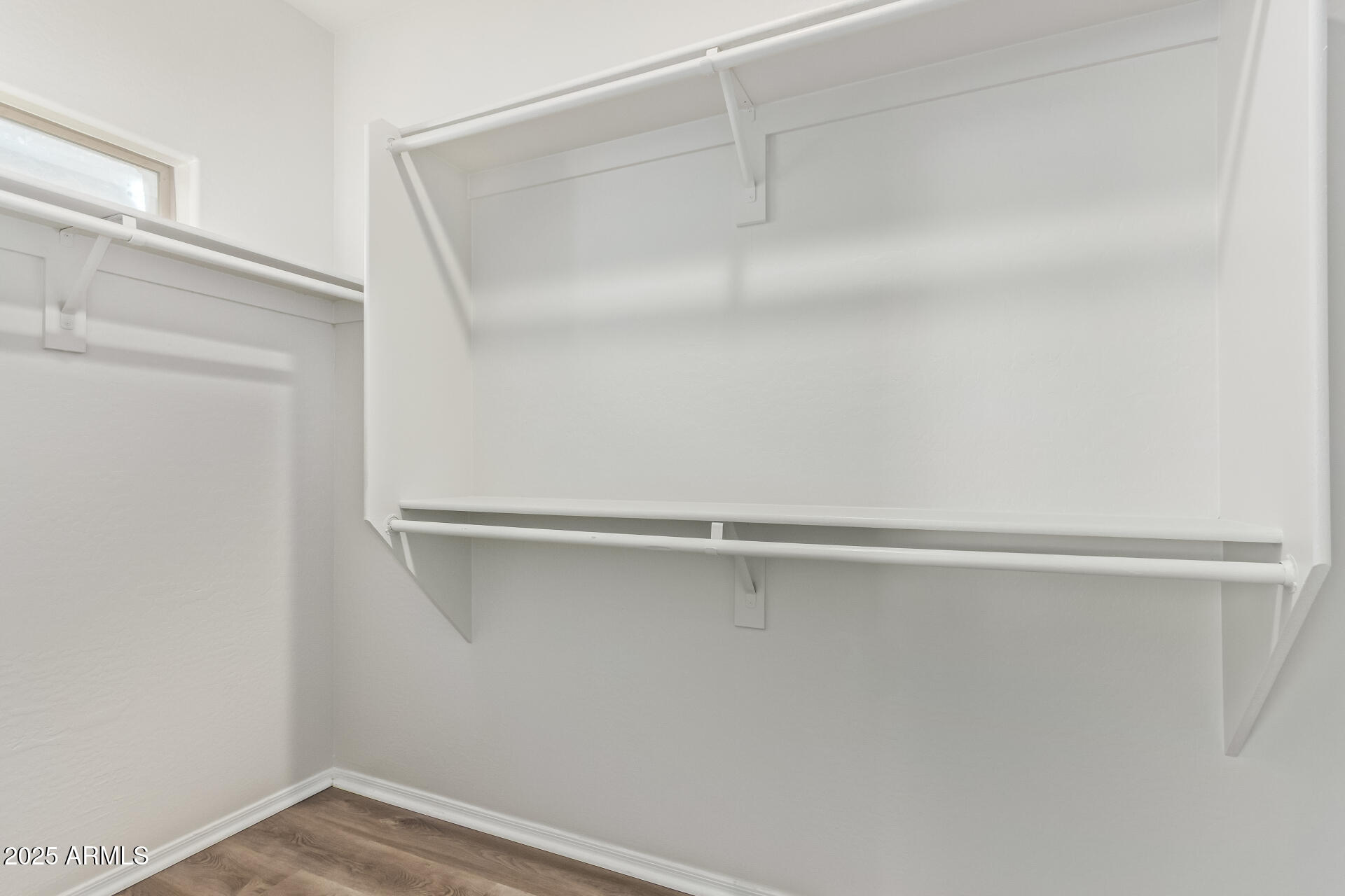 21382 East Via Del Rancho Queen Creek, AZ 85142 - Photo 16 of 29 a view of an empty walk in closet