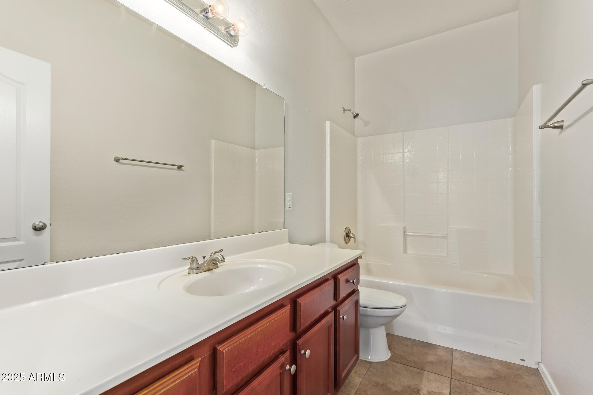 21382 East Via Del Rancho Queen Creek, AZ 85142 - Photo 19 of 29 a bathroom with a sink a toilet and shower