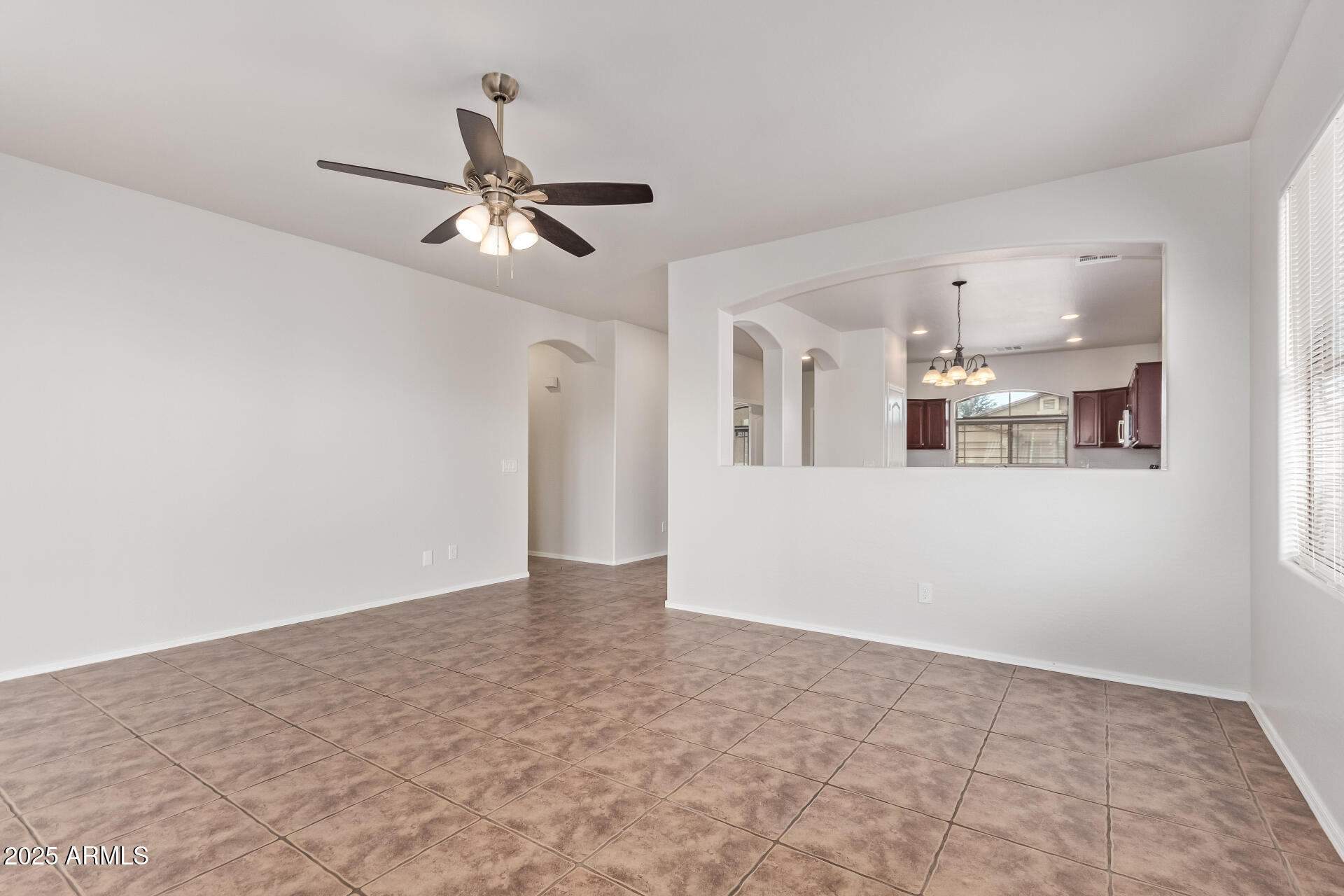 21382 East Via Del Rancho Queen Creek, AZ 85142 - Photo 3 of 29 a view of a kitchen with natural light