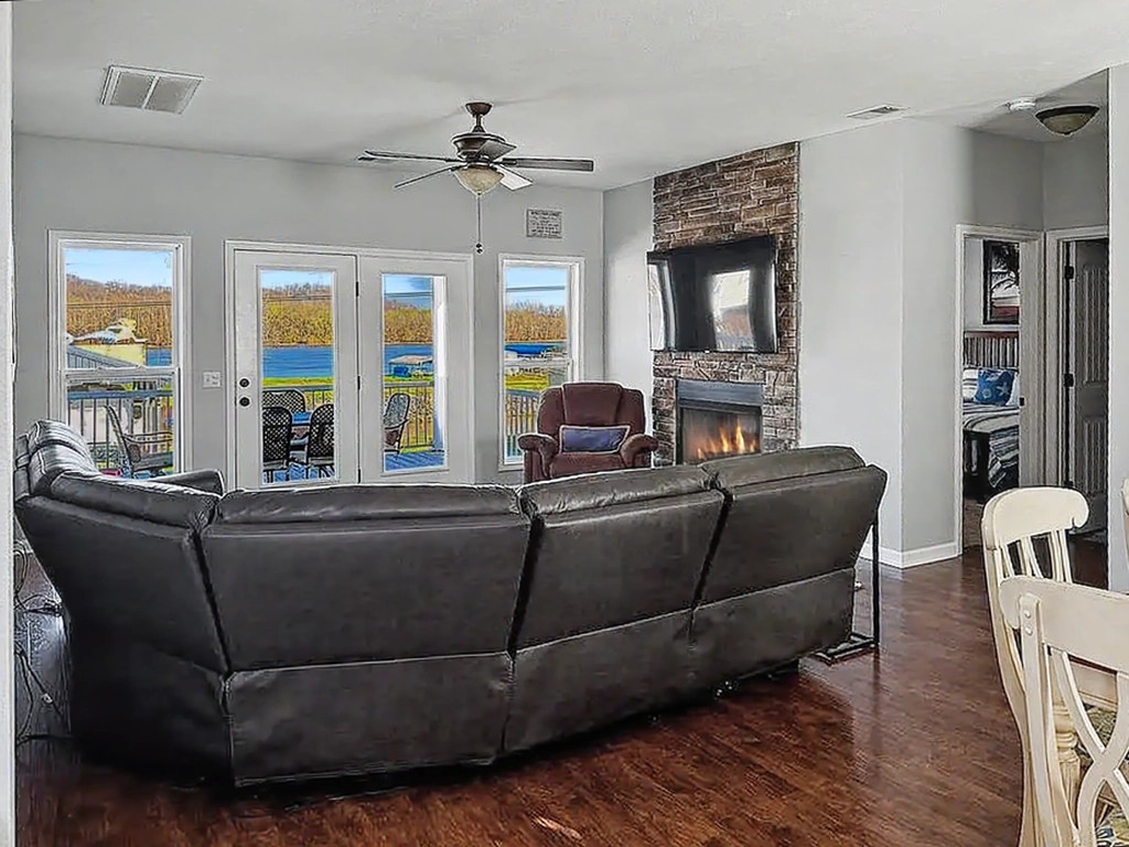 175 Ellen Lane Decaturville, TN 38329 - Photo 16 of 25 a living room with furniture and large windows