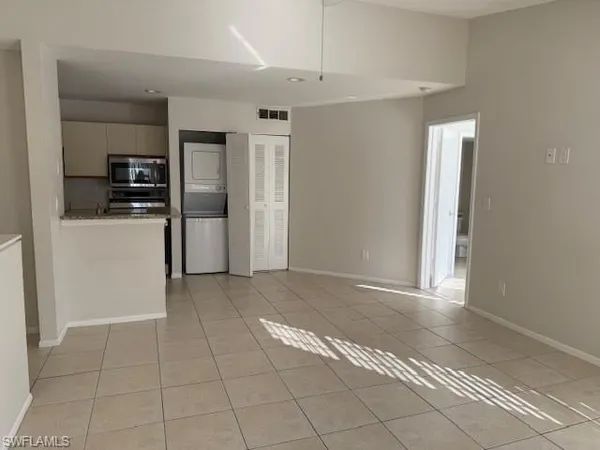 a view of a room that has a window in it