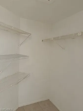 a view of a room that has a window in it