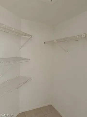 a view of a room that has a window in it