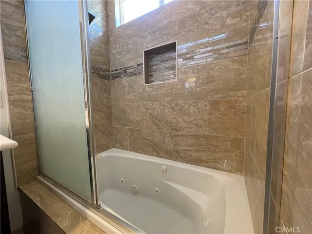 a bathroom with a bathtub