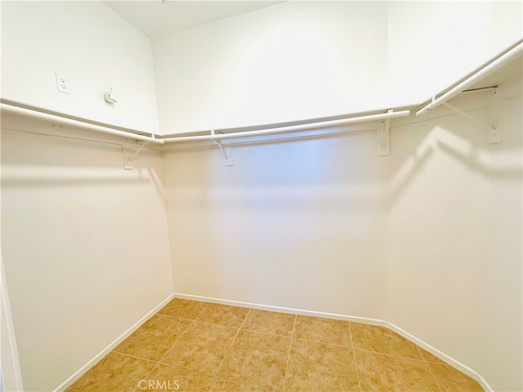 83107 Greenbrier Drive Indio, CA 92203 - Photo 19 of 29 a view of a room with racks on the wall