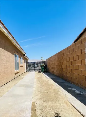 a view of a back yard of the house